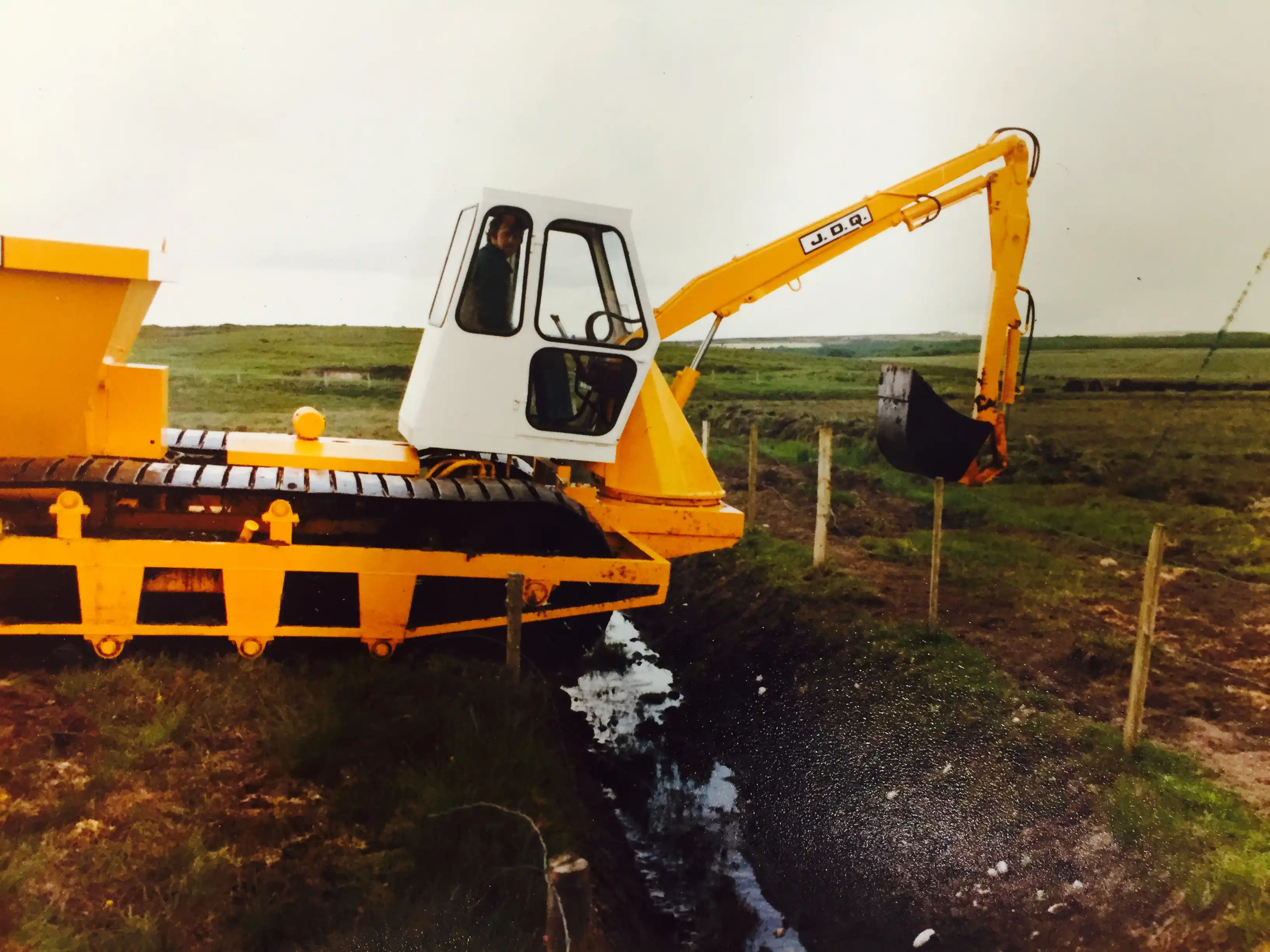 JDQ excavator working on the bog