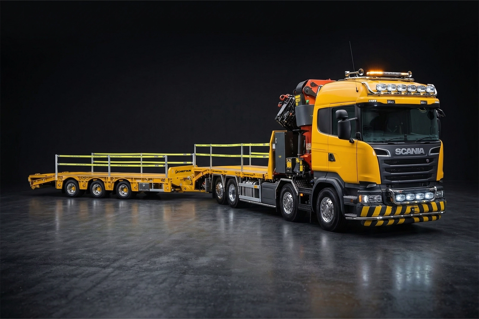 Chieftain drawbar low loader pulled by a yellow Scania truck