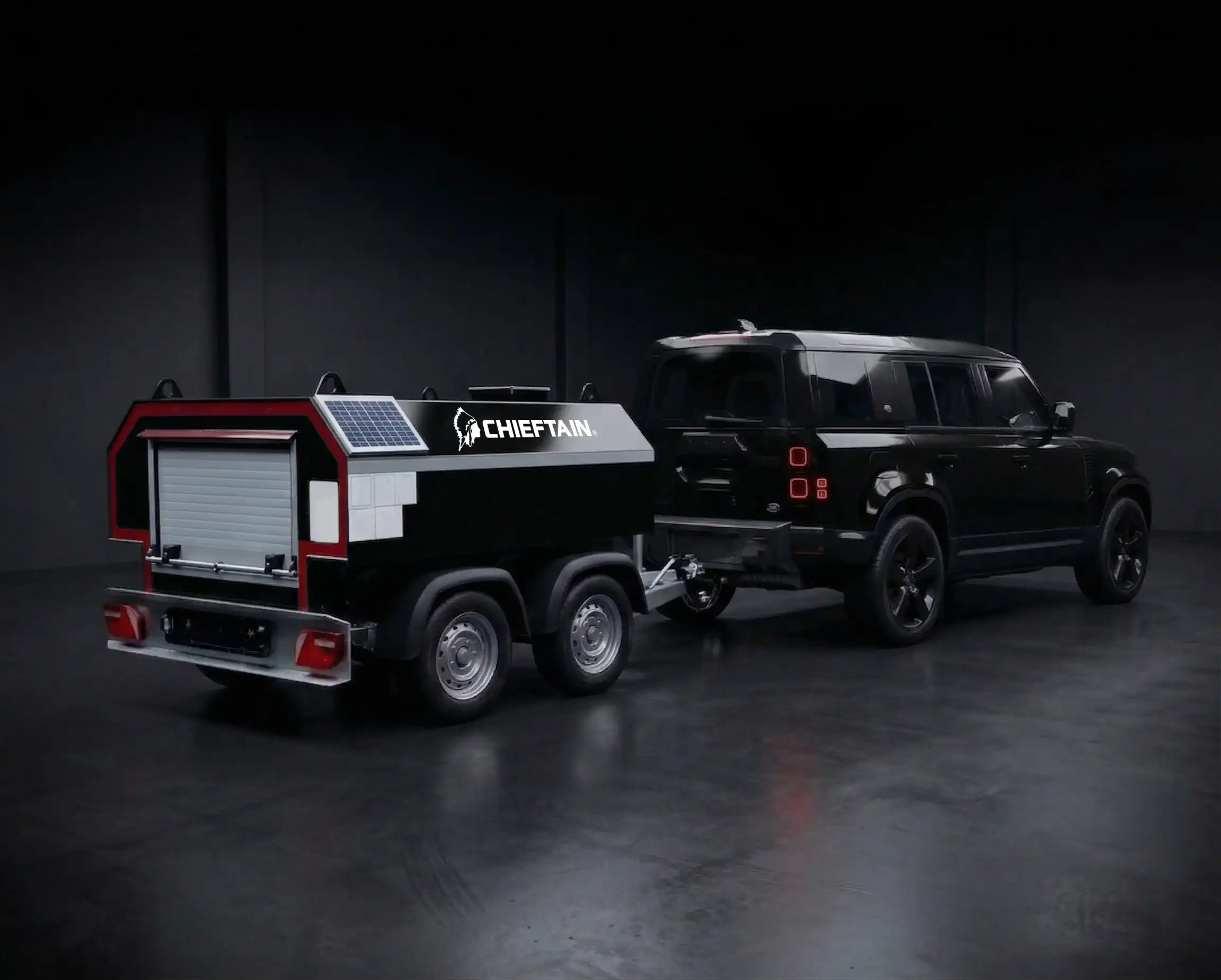 Chieftain fuel bowser towed by black Land Rover Defender