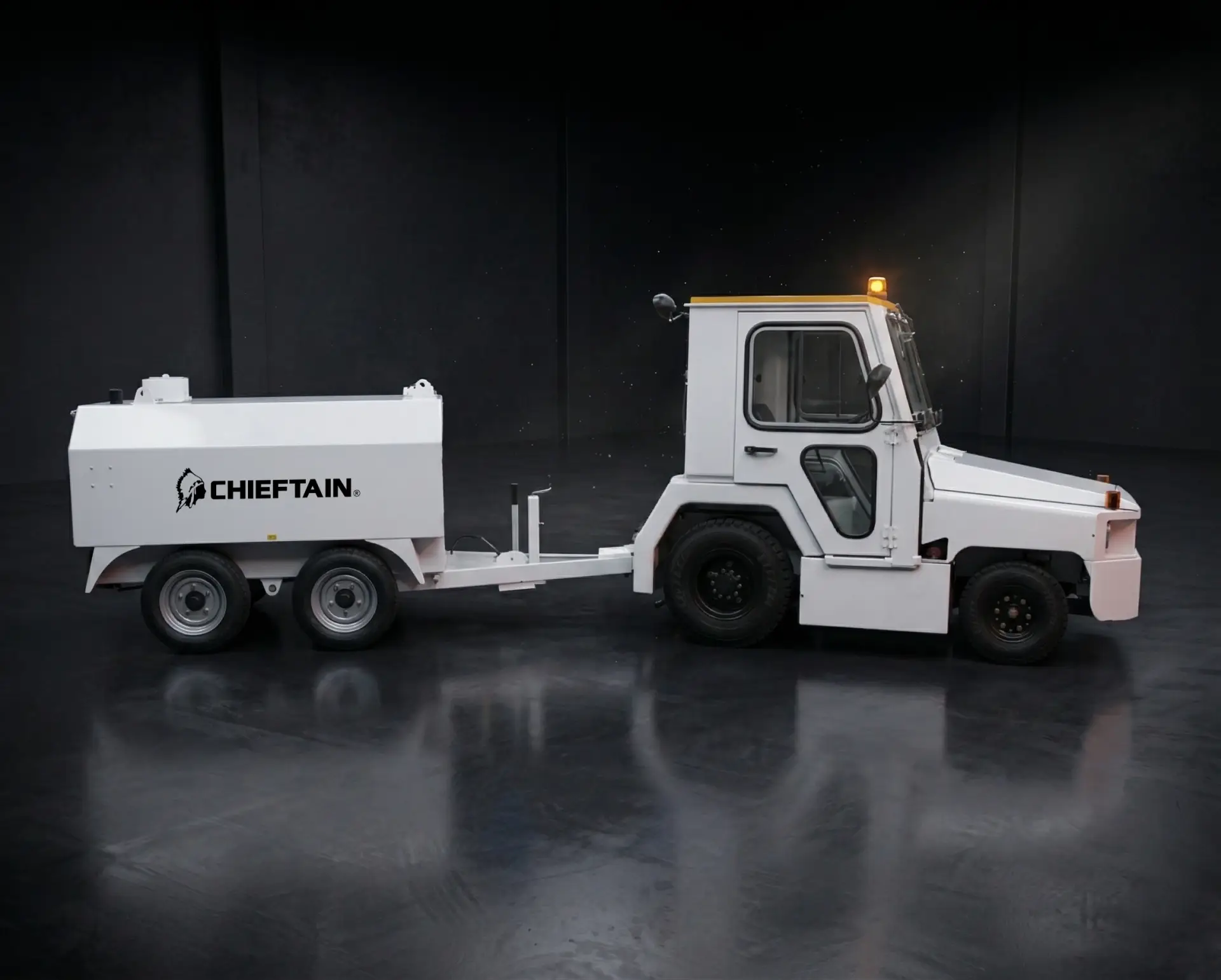 Chieftain ground support water bowser towed by an airfield tug